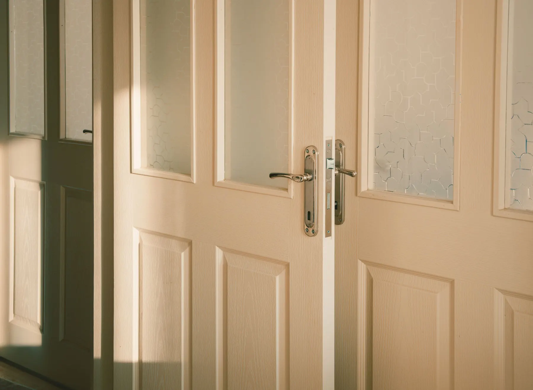 Cream interior door in soft daylight